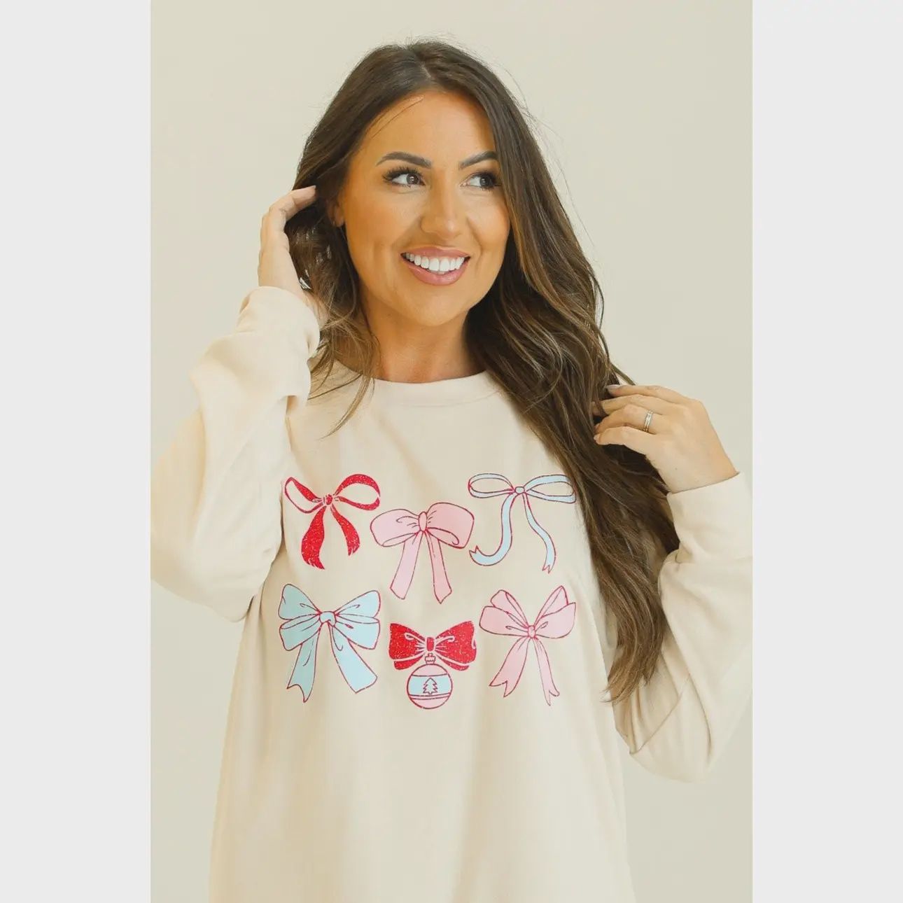 BOW GRAPHIC SWEATSHIRT