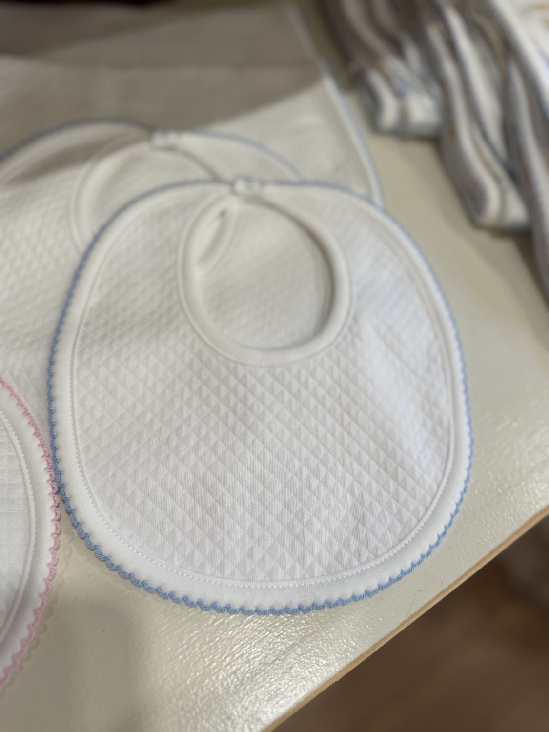 MILANO BLUE TRIM BABY BIB