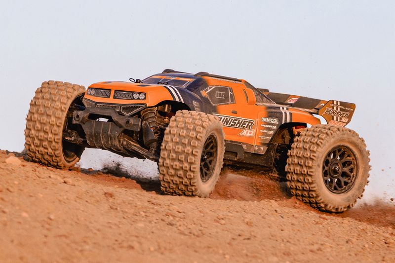 COR00231-O Corally Punisher XD 4WD 2S Small Scale, RTR Monster Truck, Orange