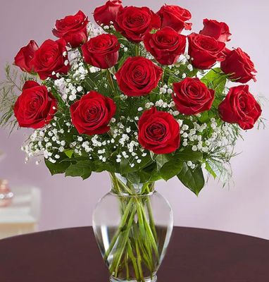 2 dozen red roses , babies breath and greenery