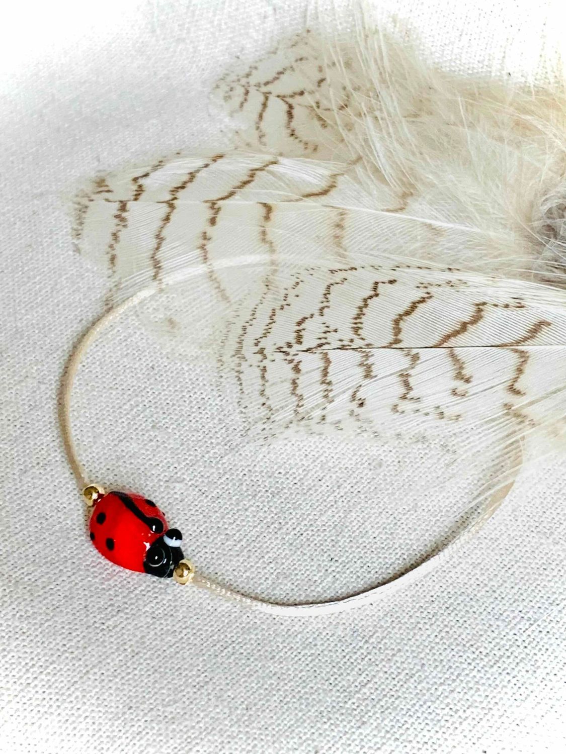 Armband "lieveheersbeestje" - goud/zilver