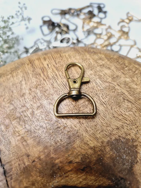 Durable lobster hook for secure keychain and bag attachments

