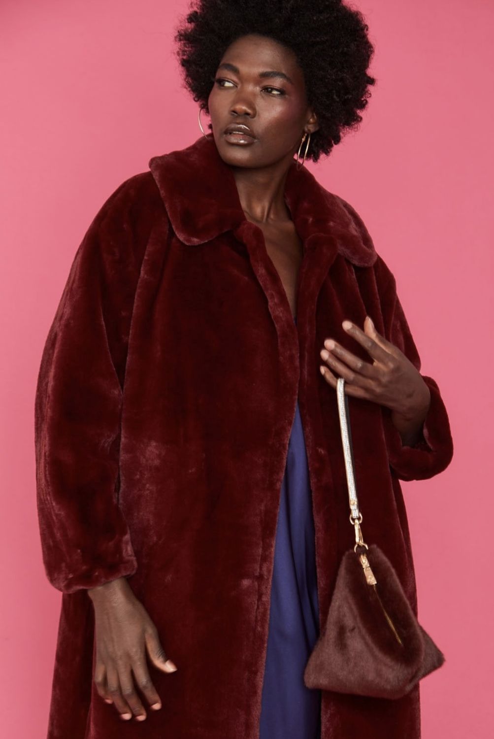 Burgundy faux fur pyramid bag