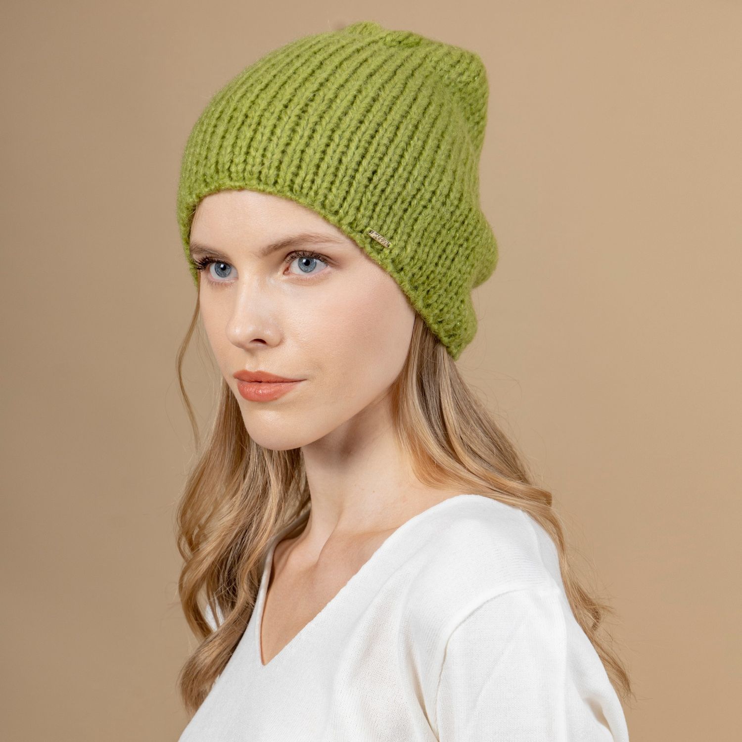 Green knitted beanie hat