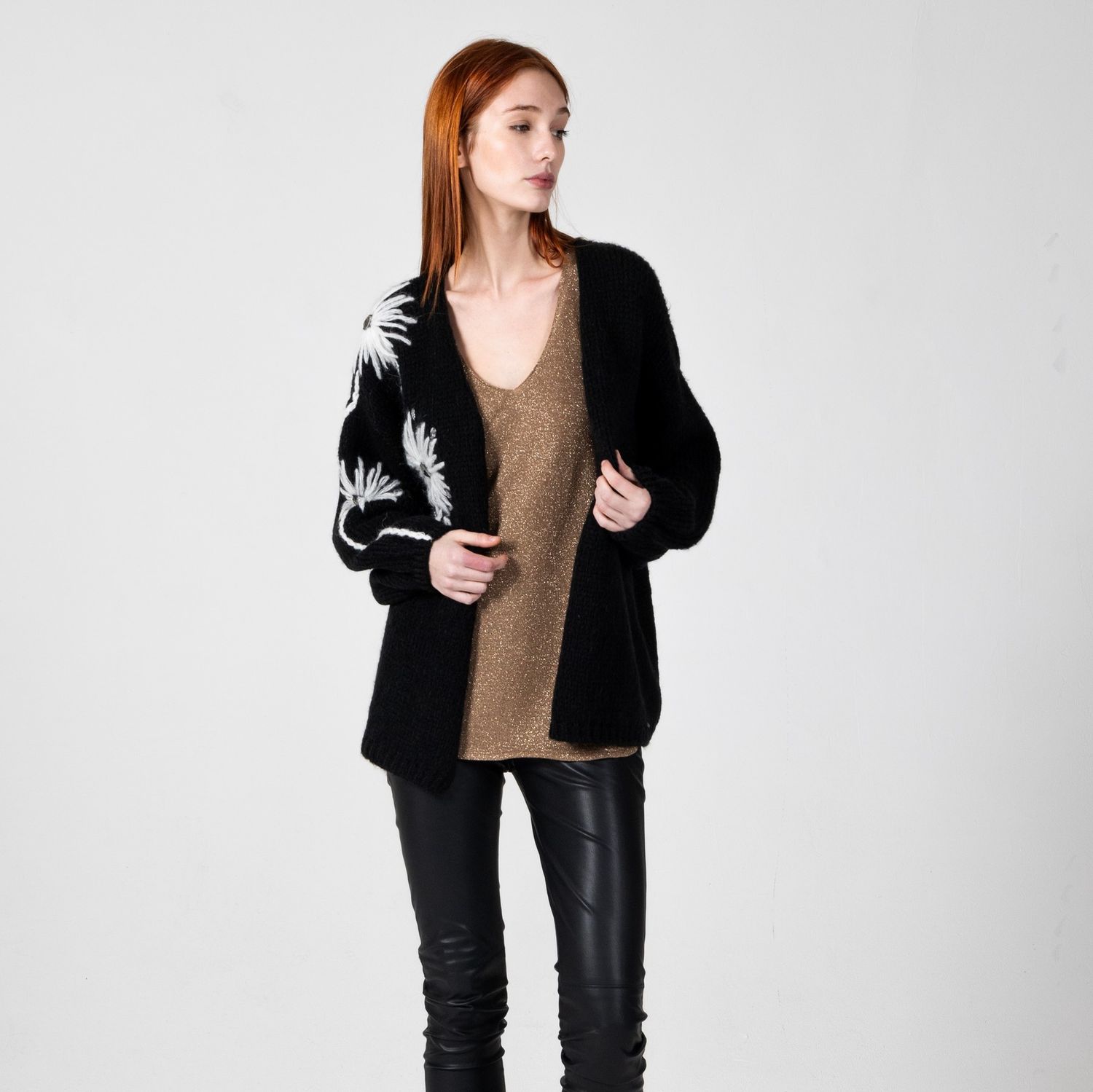 Black cardigan with embroidered flower detail