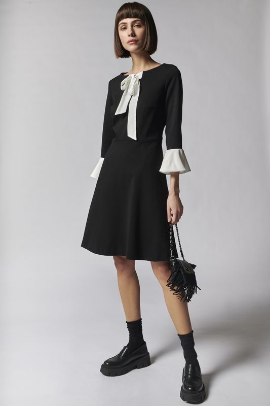 Black dress with pussy bow and cuff detail