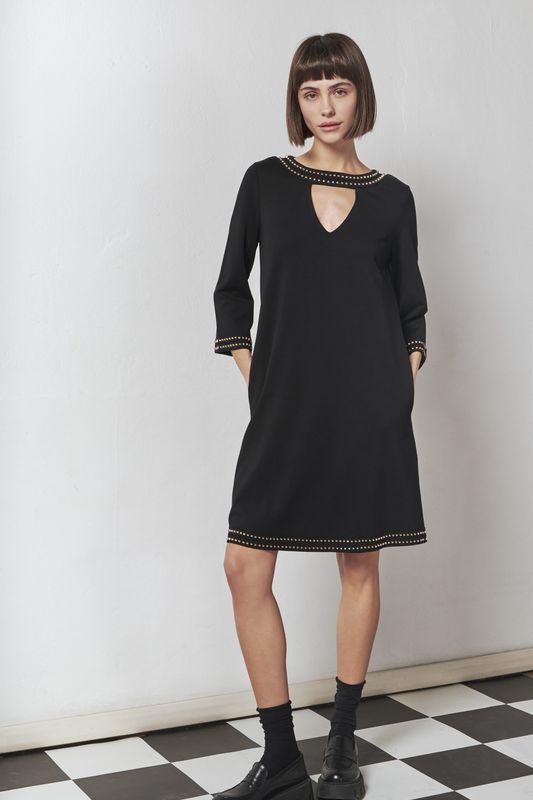 Black dress with gold stud detail