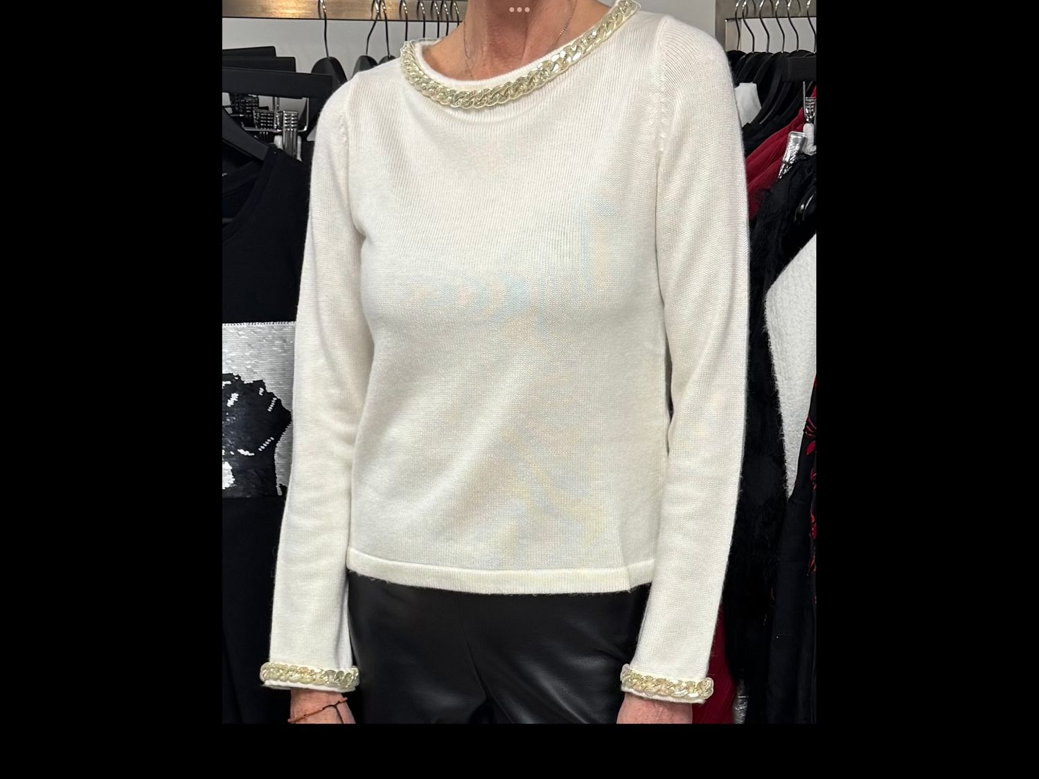 Cream jumper with gold chain embellishment