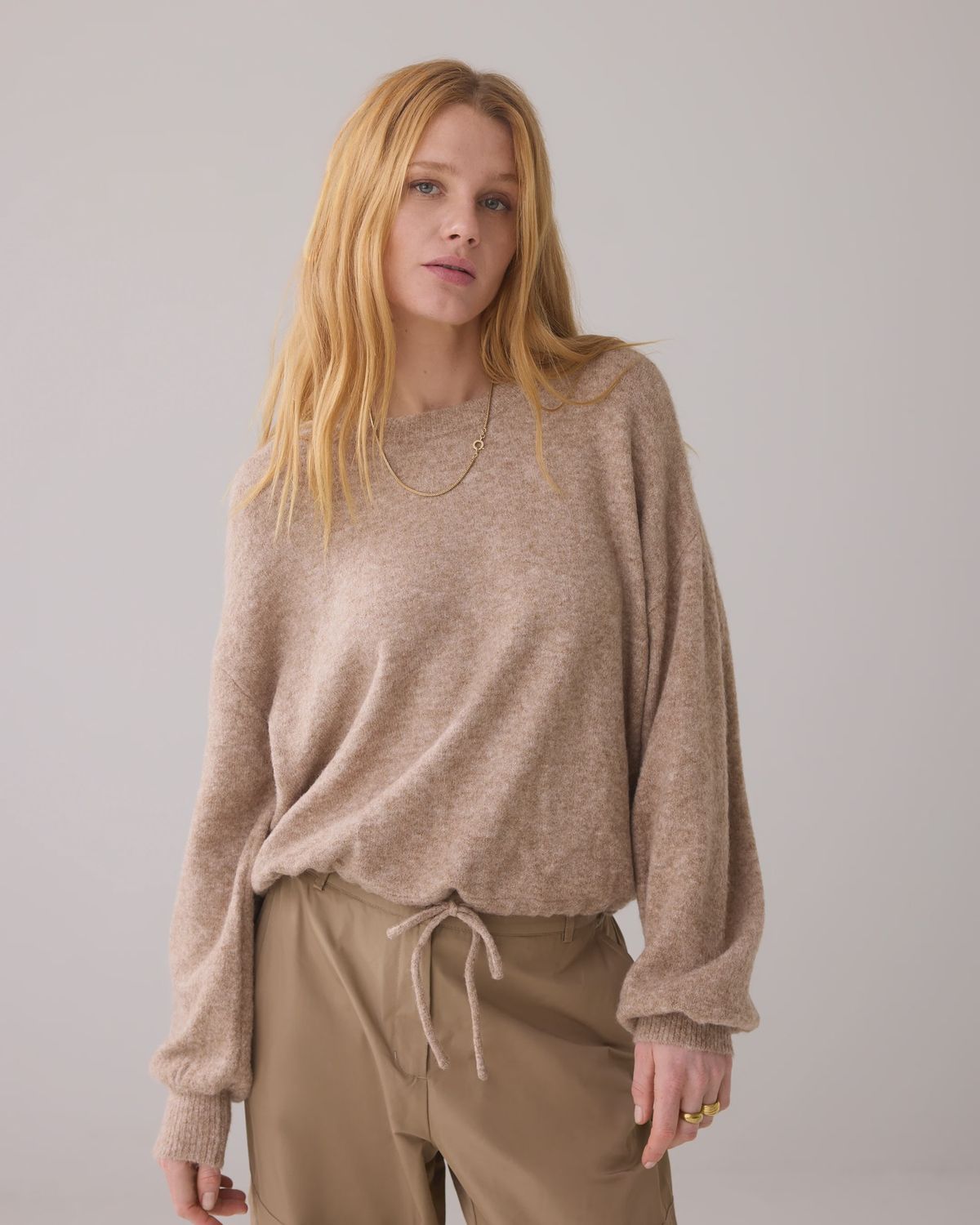 Oversized beige jumper with drawstring waist