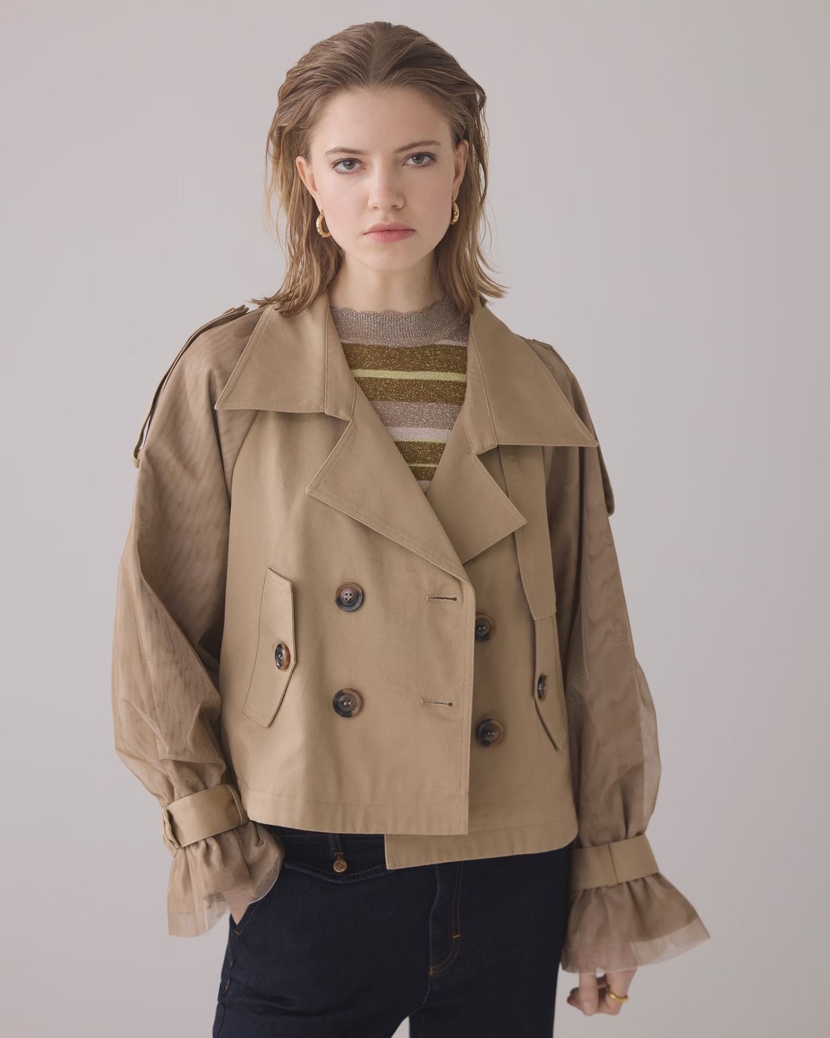 Beige short trench coat with mesh sleeves