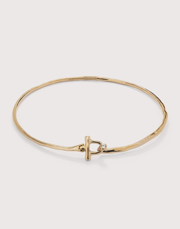 Rigid necklace in gold with white topaz