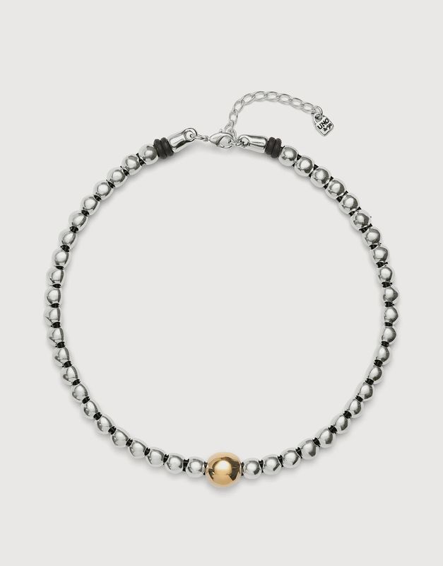 Beaded necklace in silver with larger gold bead