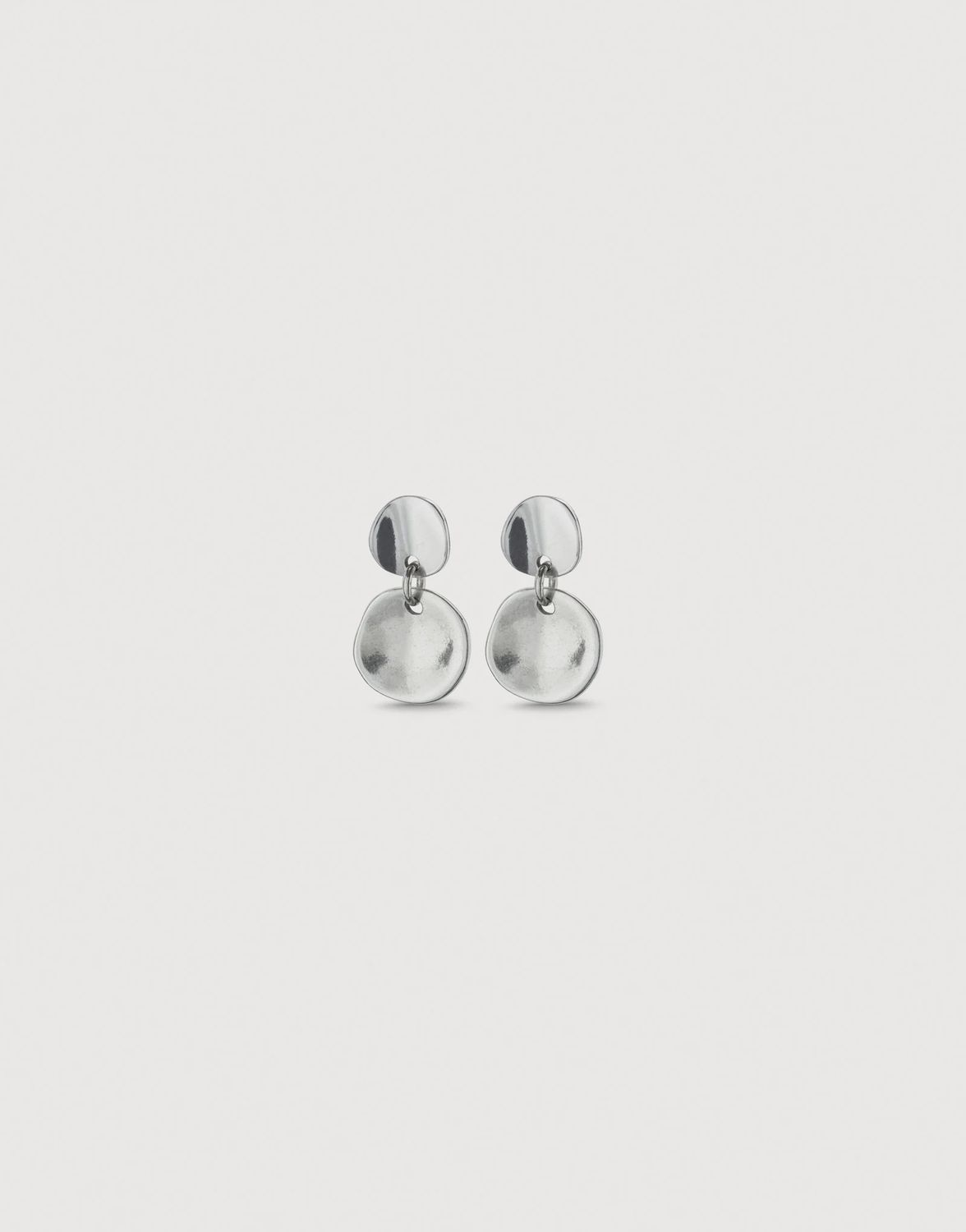 Irregular circle earrings in silver