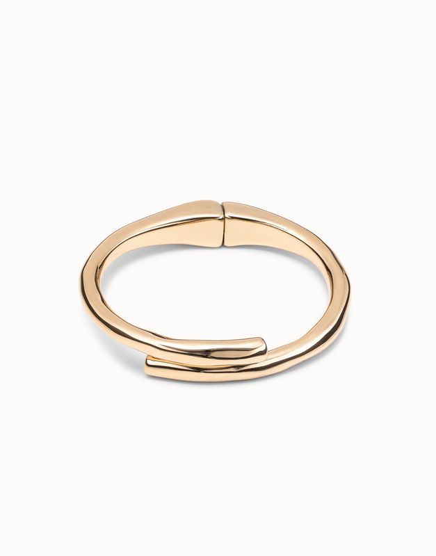 Tubular shaped bangle bracelet in gold