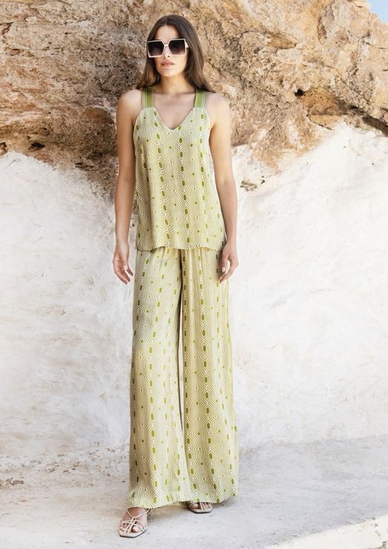 Lime green geometric pattern wide leg trousers
