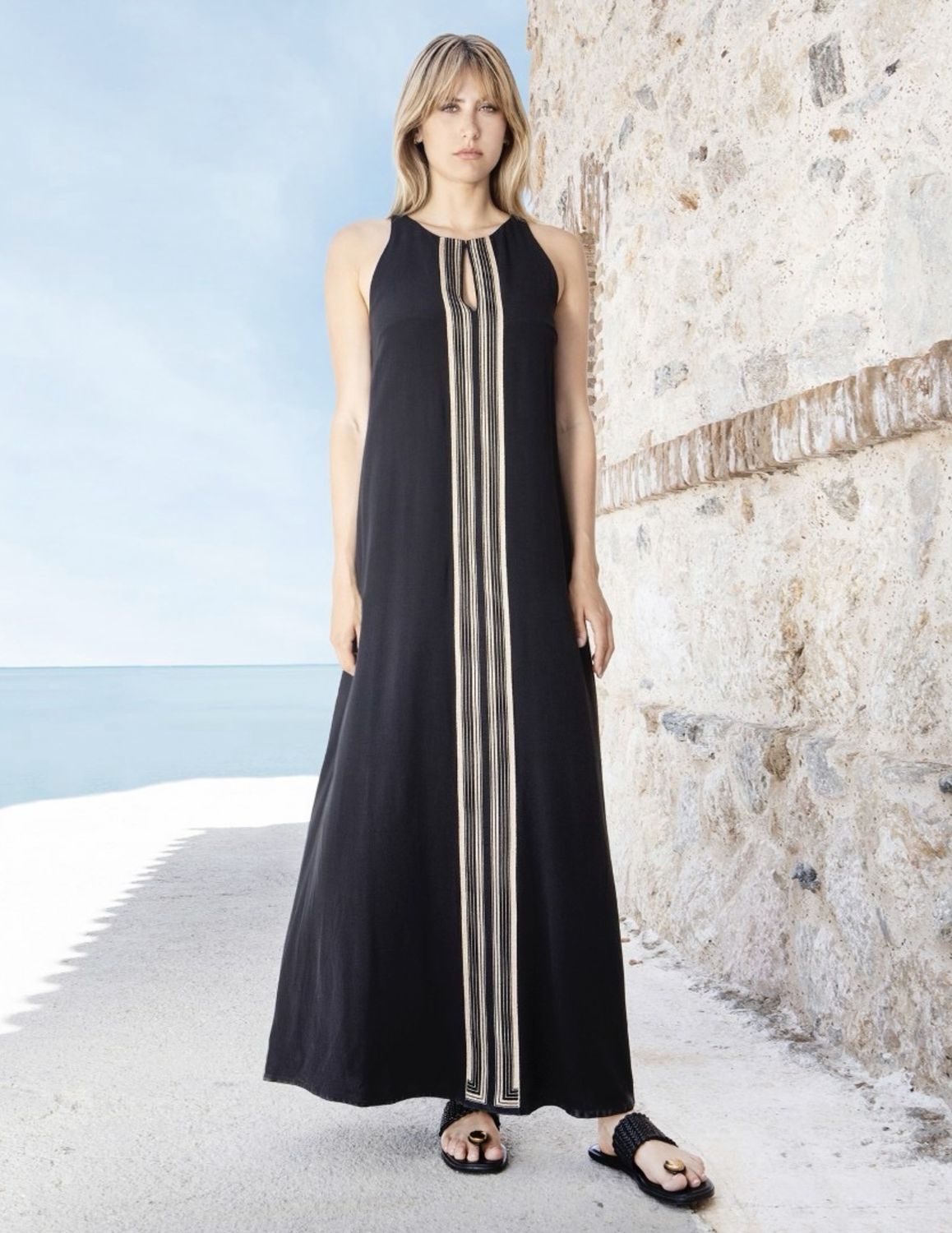 Black crepe maxi dress with gold detail