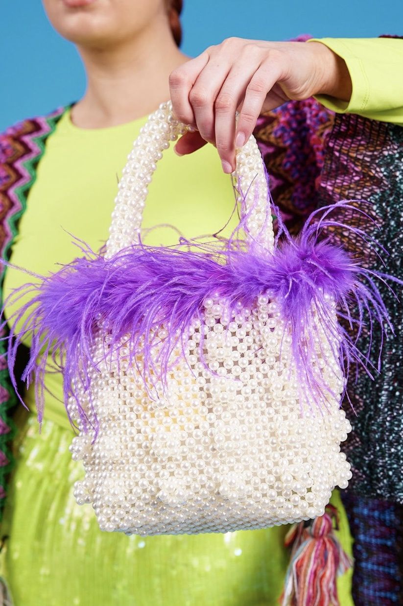 Purple faux Pearl bag with feather trim
