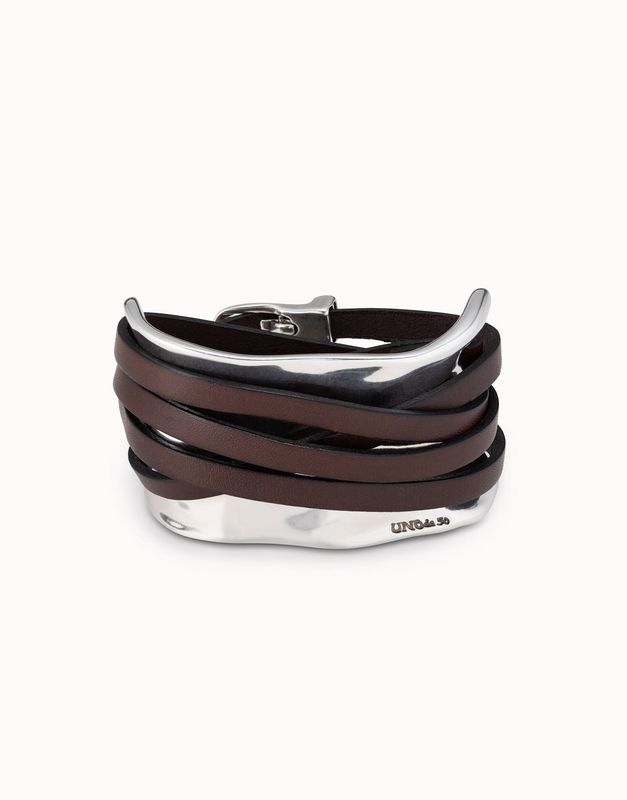 Silver bracelet with leather straps