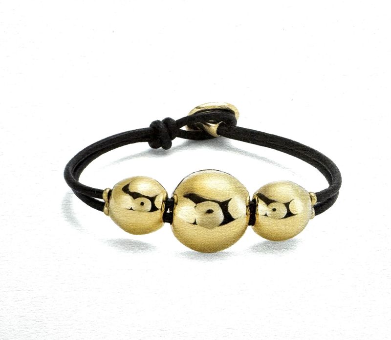 Leather bracelet with 3 gold beads