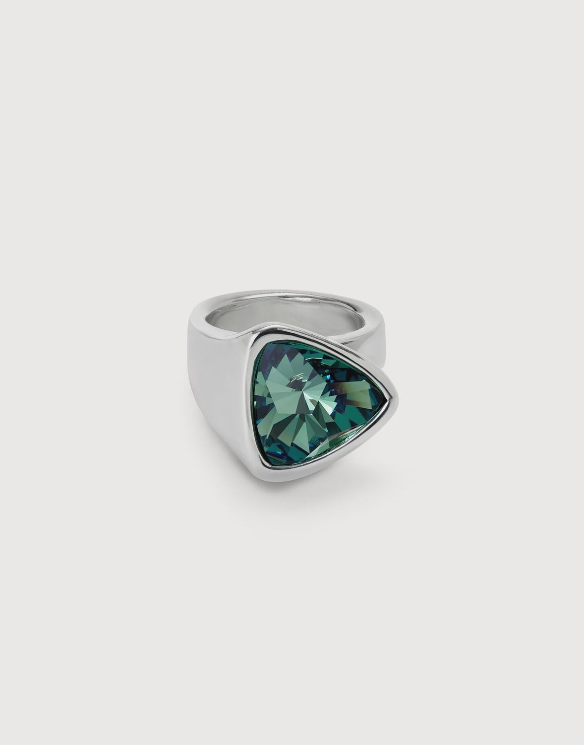 Silver ring with triangular green crystal