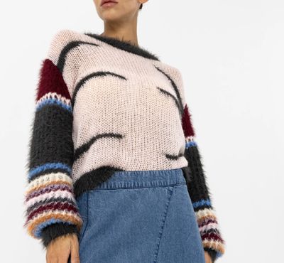 Pale pink knitted jumper with crochet sleeves