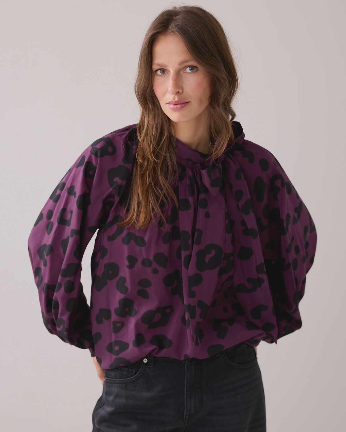 Bow tie blouse in deep purple and black