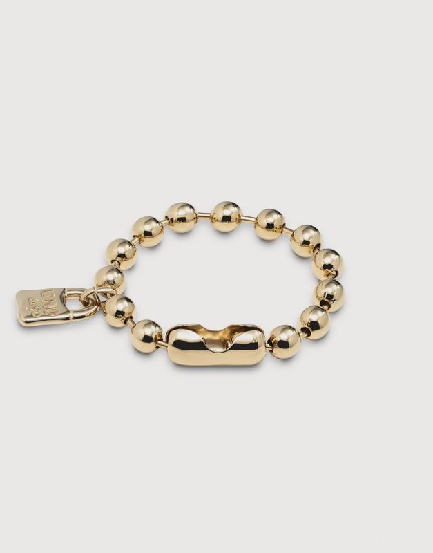 Beaded bracelet with padlock charm gold
