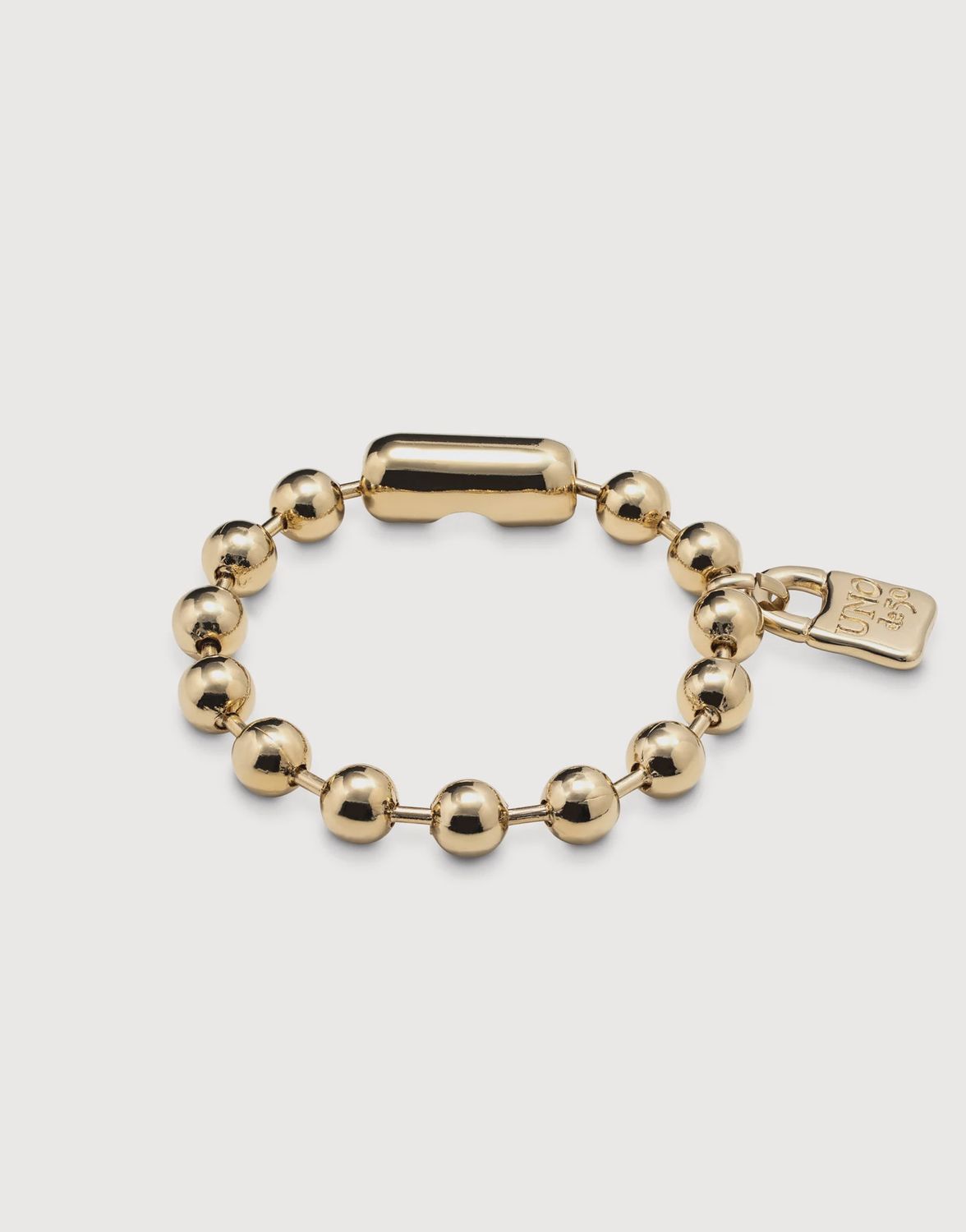 Beaded bracelet with padlock charm gold