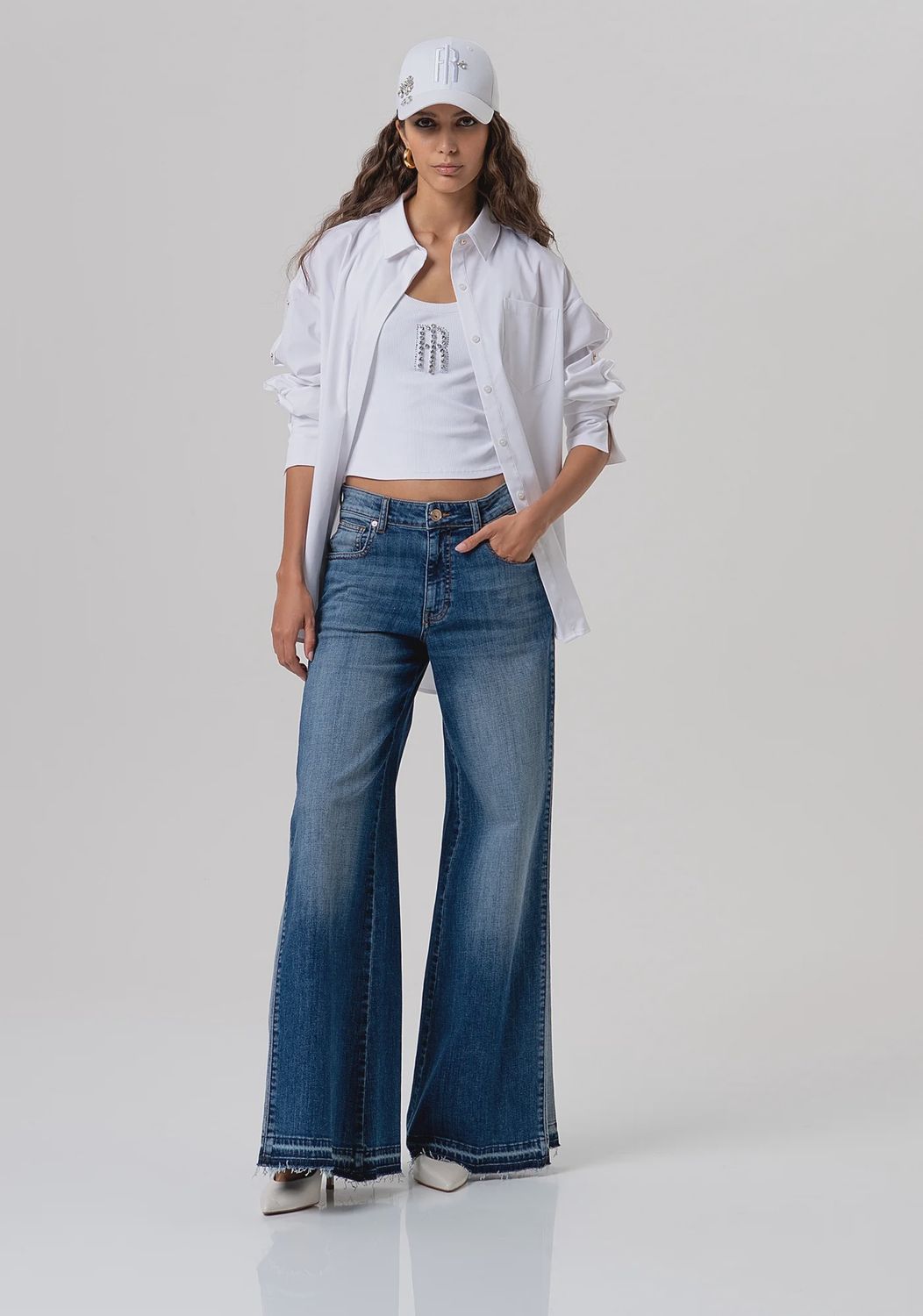Flare jeans with contrast panel in mid wash blue denim