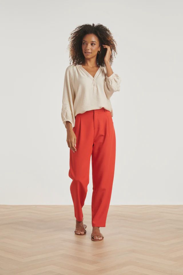 Blouse with embroidered sleeve in cream