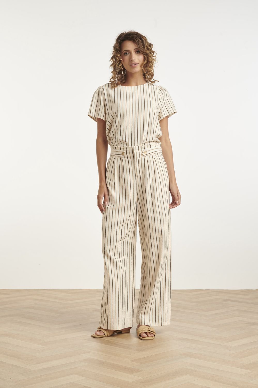 Wide leg trousers in cream, with brown pinstripe