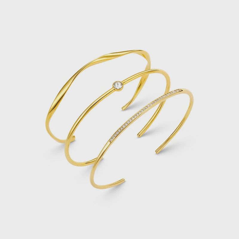 Crystal and wave stacking bracelets gold