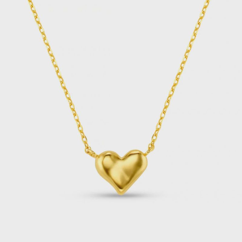 Molten heart necklace gold