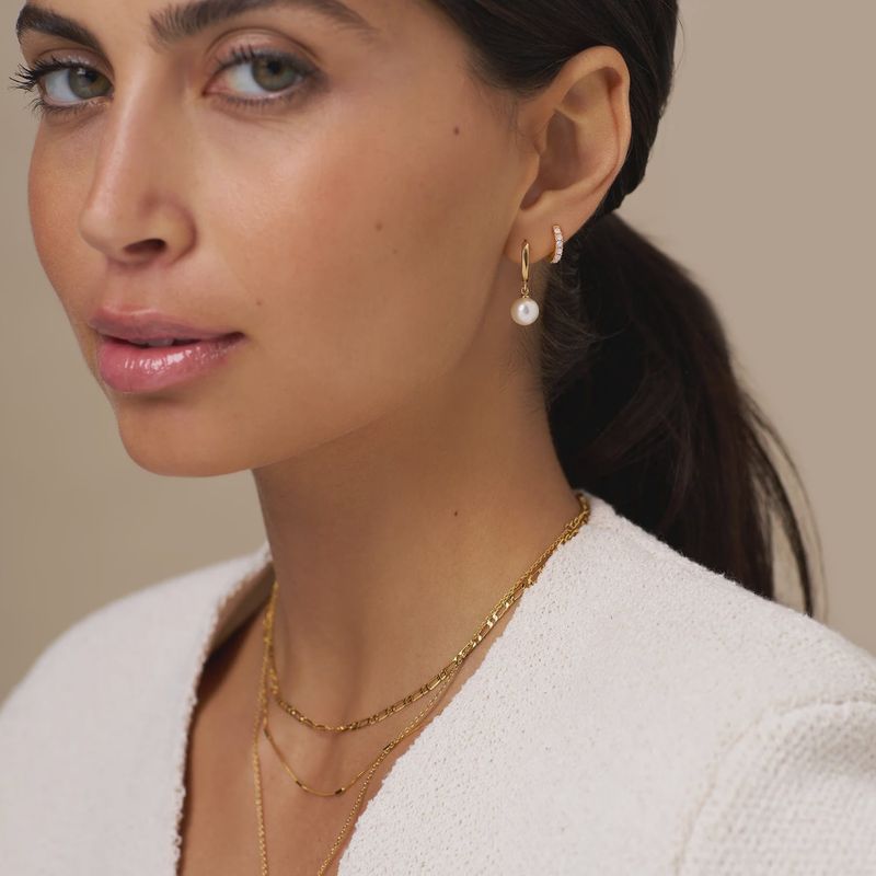 Pearl drop huggie hoop earrings gold