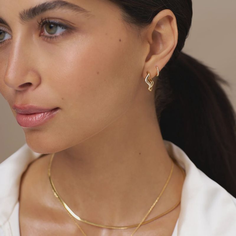 Organic wave hoop earrings gold