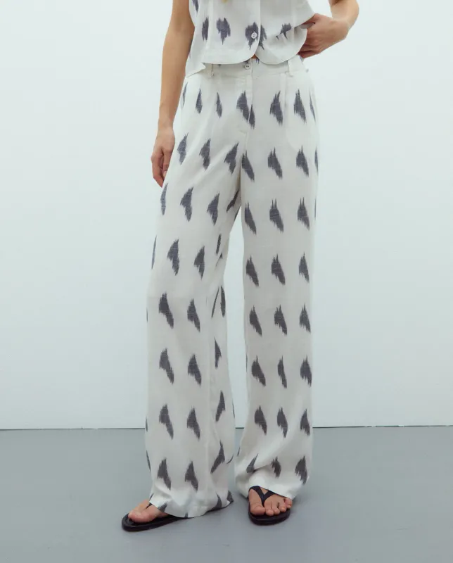 Cream trousers with geometric print