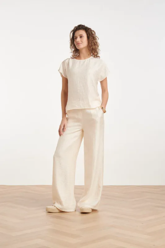 Creme wide leg trousers