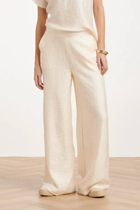Creme wide leg trousers