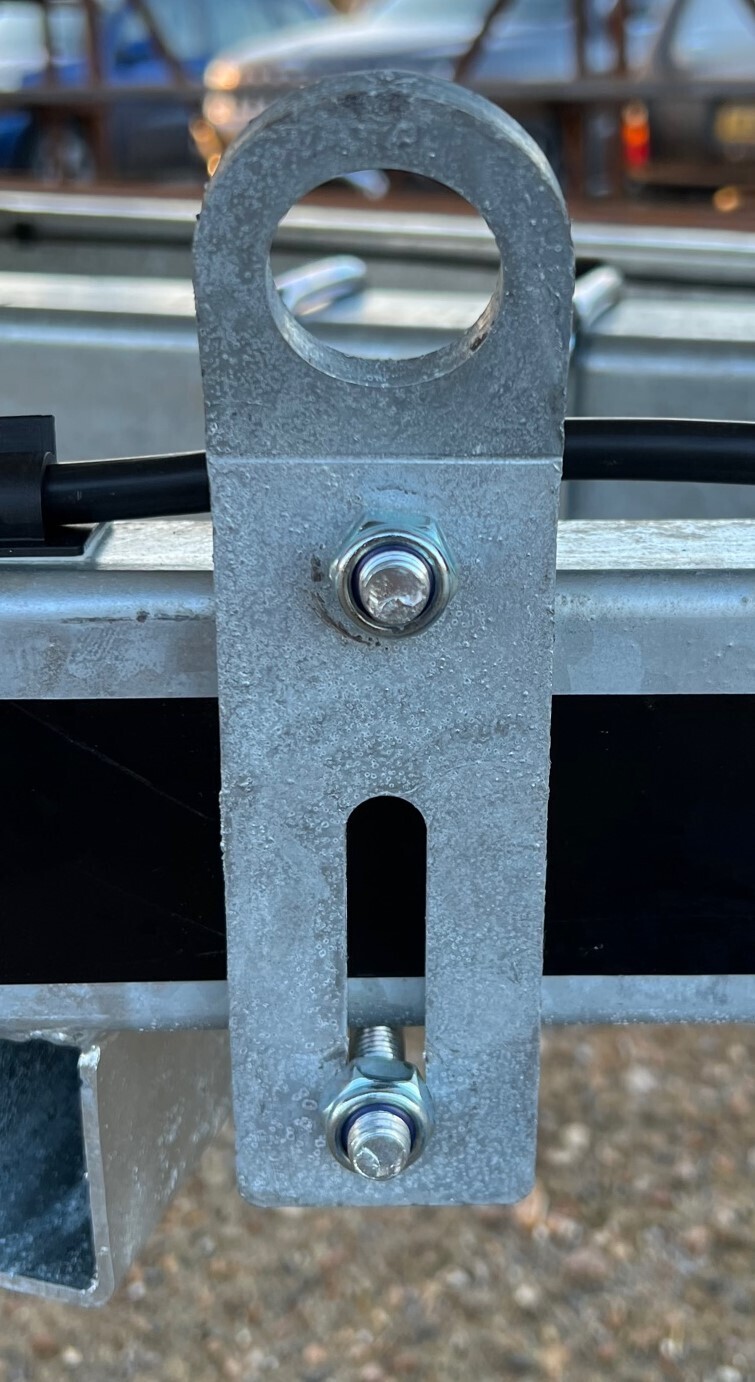 Bolt on tie down point loop hook