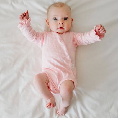 RUFFLE CUFF LONG SLEEVE WINGED BODYSUIT