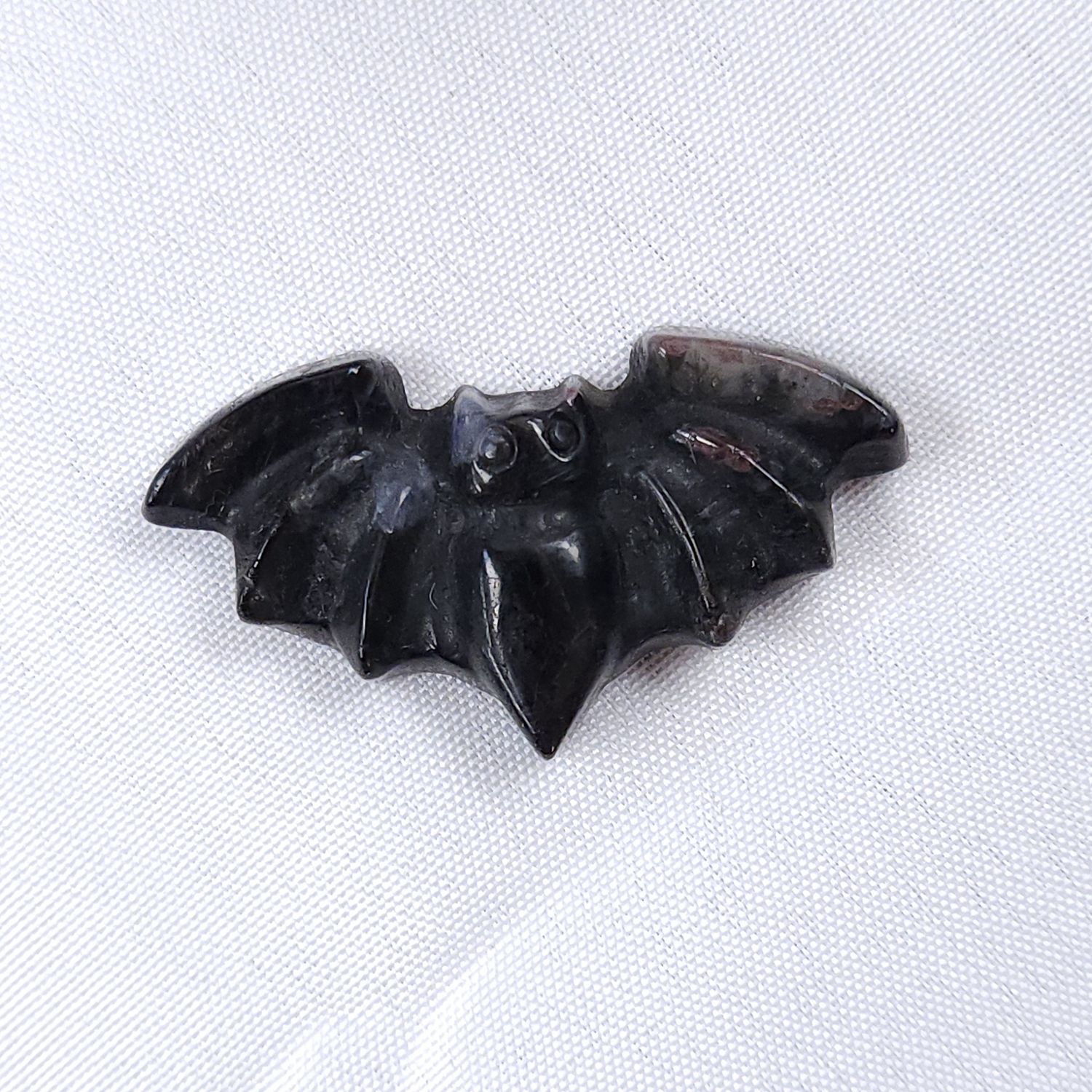 Crystal Bat Carving Crystal Bat Carving, Crystal: Garnet in matrix