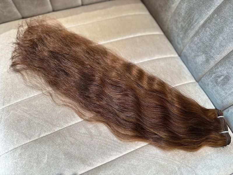 16. Naturgewellte Schnitthaartresse 16. Naturgewellte Schnitthaartresse