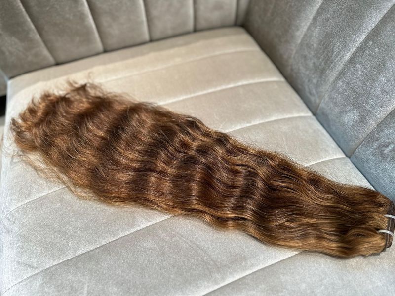 19. Naturgewellte Schnitthaartresse 19. Naturgewellte Schnitthaartresse