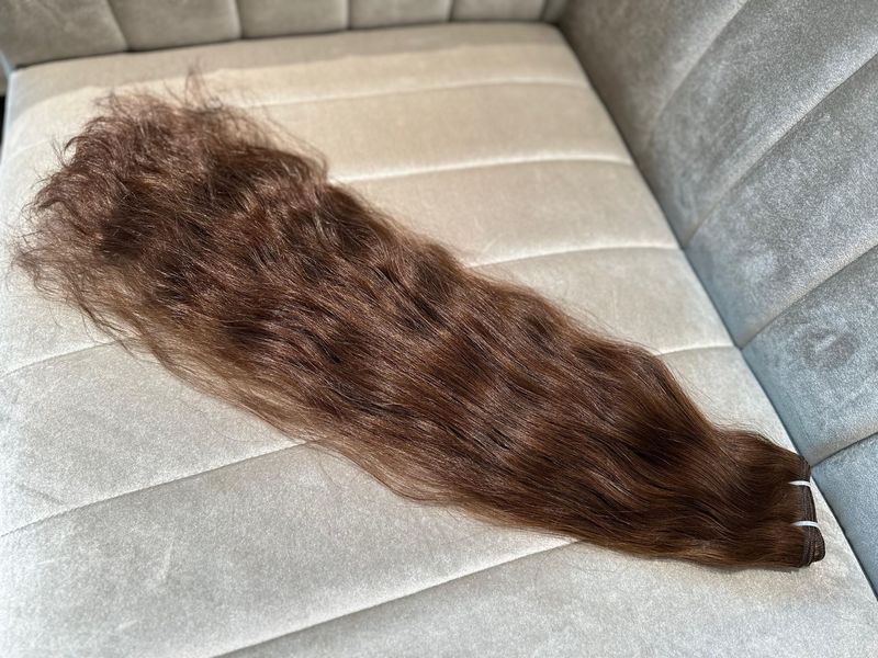18. Naturgewellte Schnitthaartresse 18. Naturgewellte Schnitthaartresse