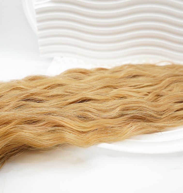 6. Naturgewellte Schnitthaartresse