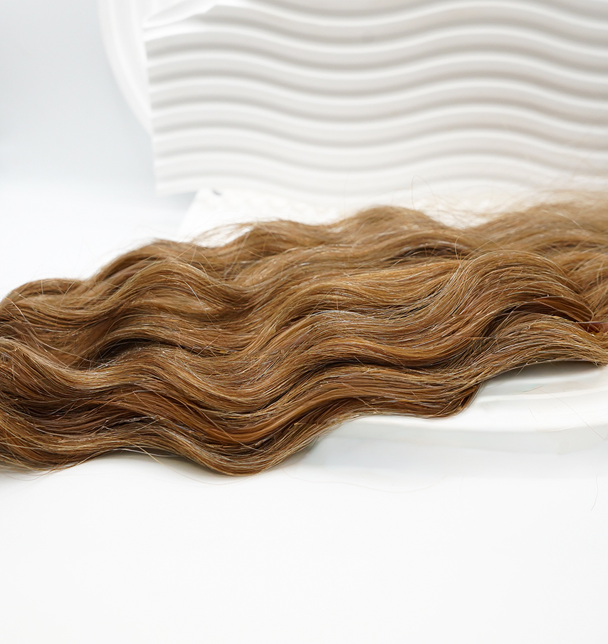 7. Naturgewellte Schnitthaartresse