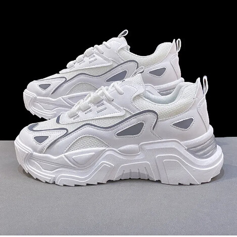 SNEAKERS WITH FLUORESCENT ACCENT