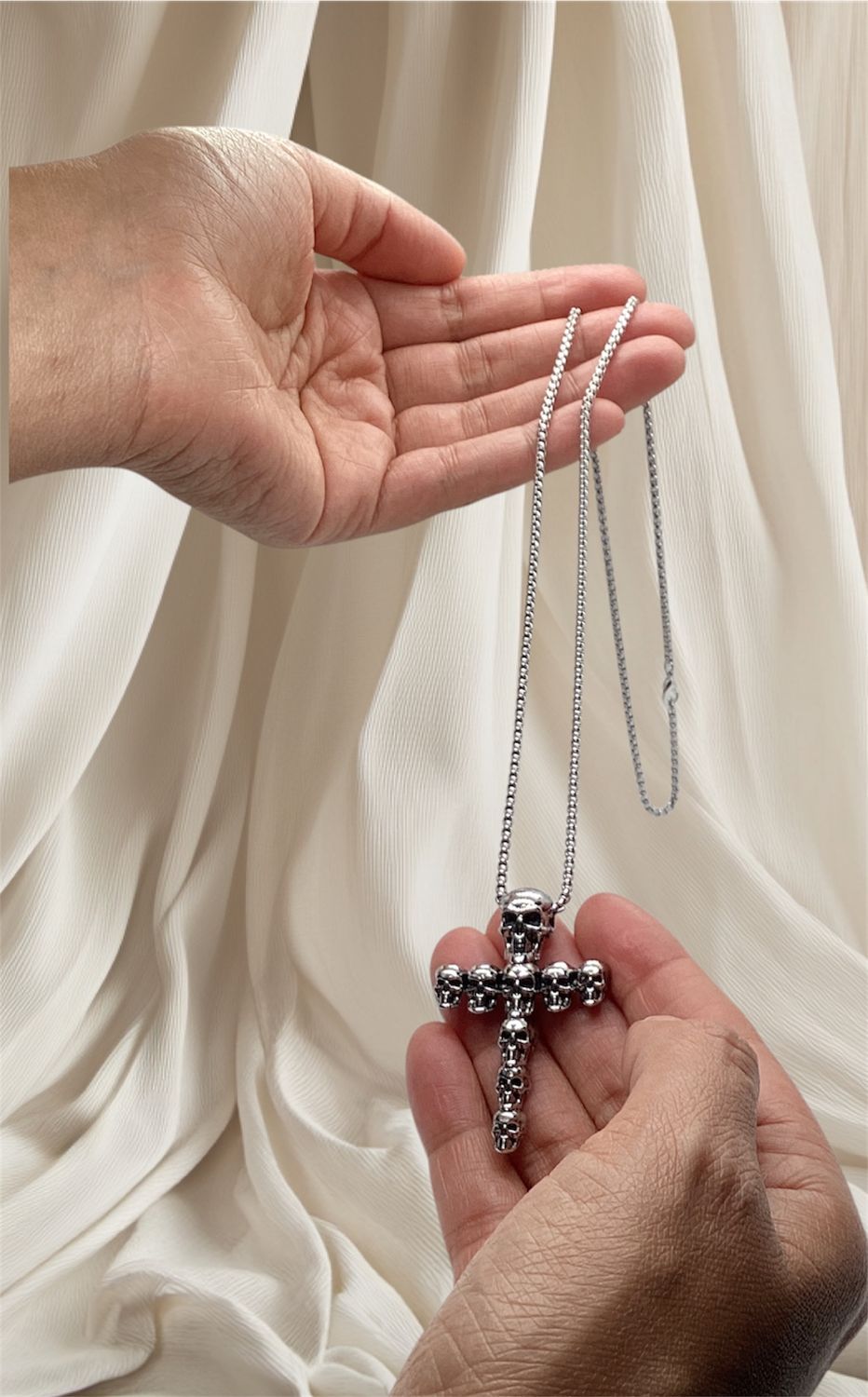 Elevate your style with this high-quality stainless steel skull-shaped cross.