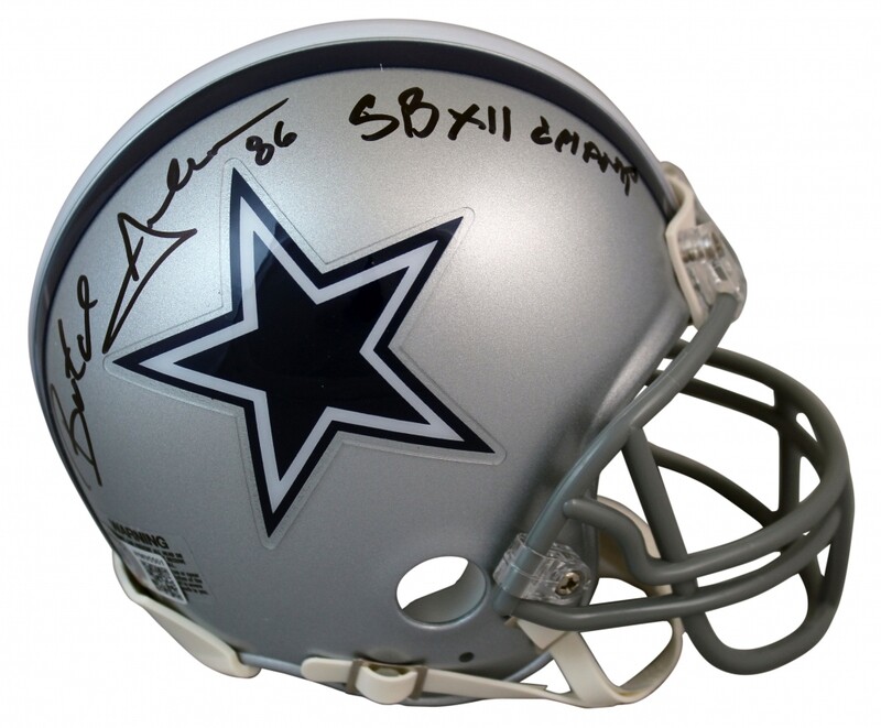 Butch Johnson Signed Cowboys Mini Helmet Inscribed Butch Johnson Signed Cowboys Mini Helmet Inscribed "SB XII Champs" (Beckett COA) and Butch Johnson Signed Jersey (Beckett COA)