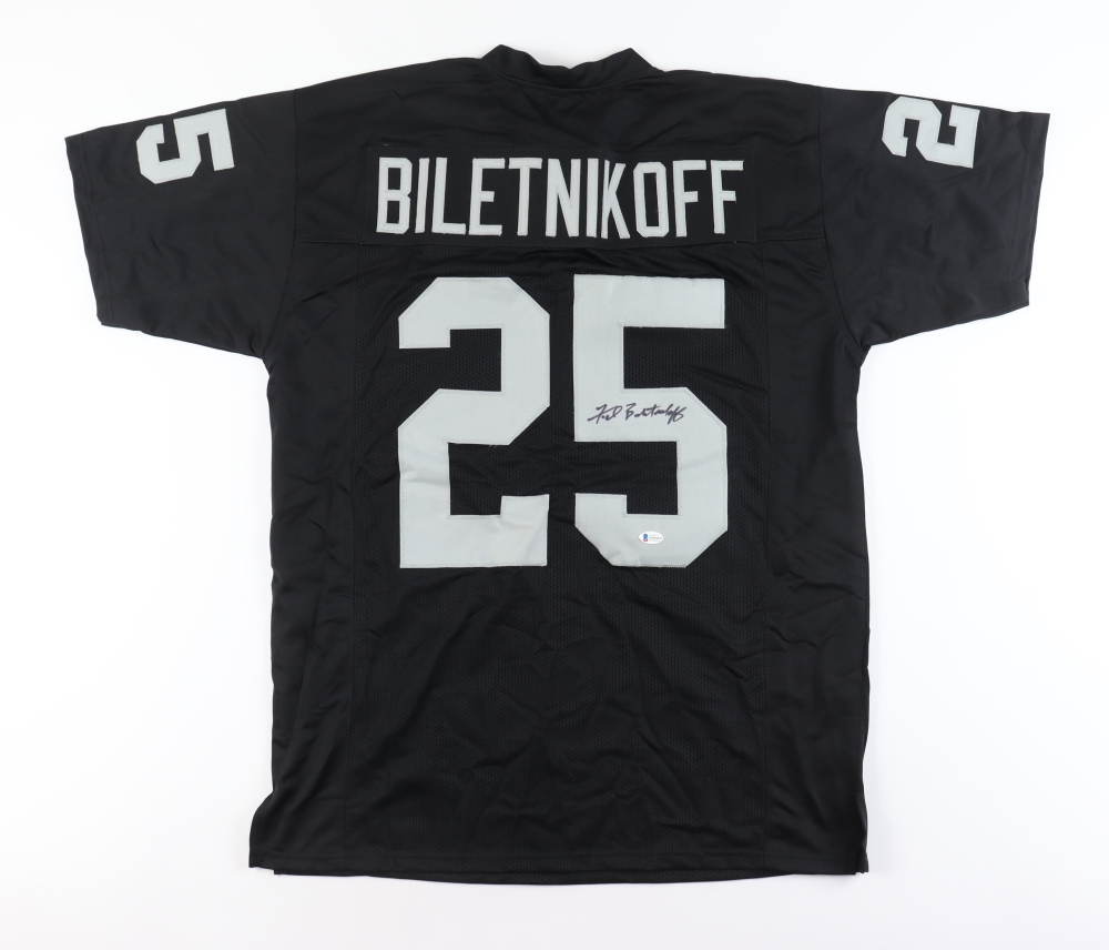 Fred Biletnikoff Signed Oakland Raiders Jersey (Beckett) & Cliff Branch Signed Oakland Raiders 8x10 Photo (Beckett)